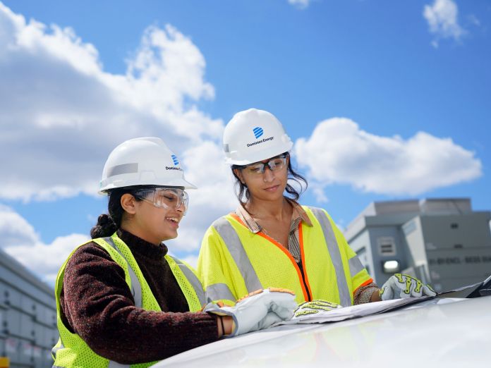 Female solar engineers at solar facility